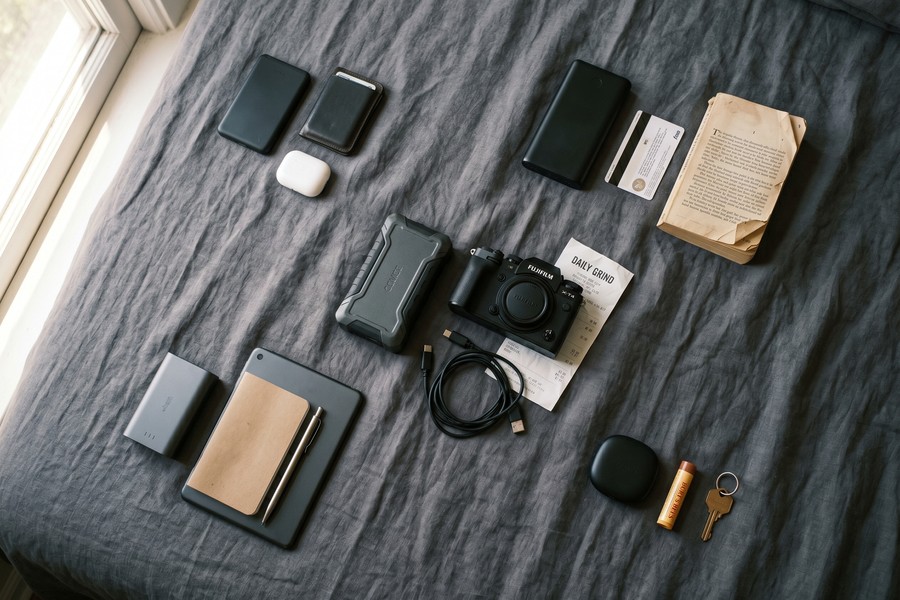 Five portable charger types side by side showing size comparison from card to brick form factor