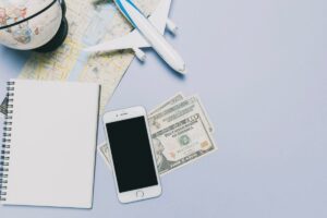 A traveler using a mobile app to find the best airport transfer deals