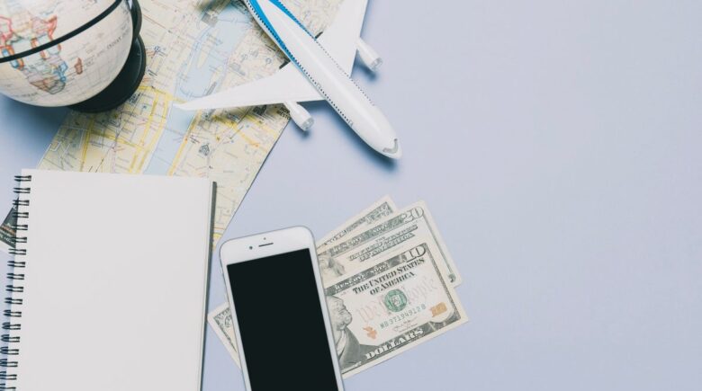 A traveler using a mobile app to find the best airport transfer deals