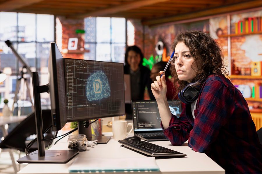 Business owner mapping AI goal to revenue metric on whiteboard