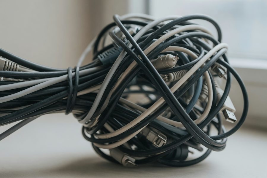 Illustration of AI-generated code spaghetti showing duplicated functions and tangled imports