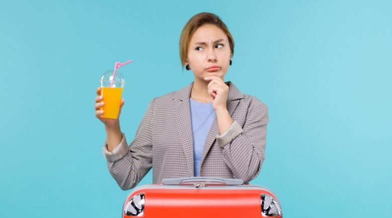 A traveler examining a loyalty program chart with a magnifying glass, highlighting the hidden truth behind travel rewards