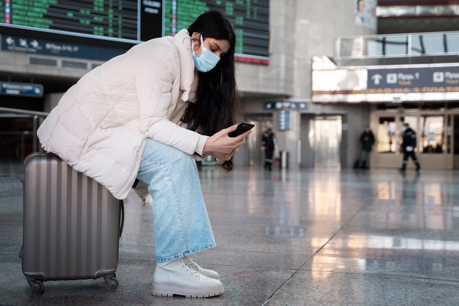 Travelers refilling bottles at a terminal fountain in 2026