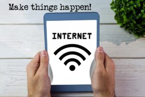 A traveler connecting to airport Wi-Fi on a laptop with a trusted VPN
