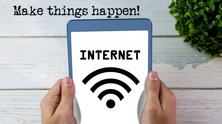 A traveler connecting to airport Wi-Fi on a laptop with a trusted VPN