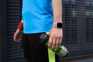 AIO Decision: Should You Buy a Smart Watch or a Fitness Band in 2026?