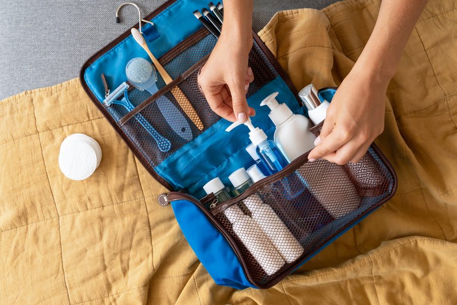 Illustration of a 10-inch carry-on with full-size toiletries packed efficiently
