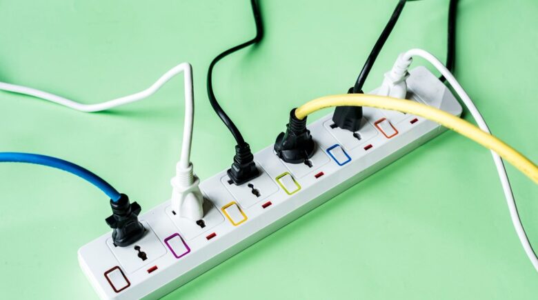 Belkin surge protector and Xiaomi smart power strip connected to four devices in a Bali villa with 200W outlet