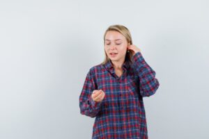 Comparison of bone conduction headphones, over-ear headphones, and hearing aids displayed side by side