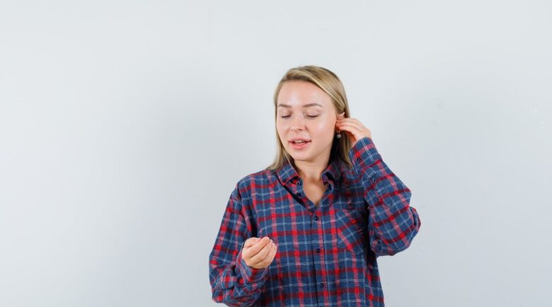 Comparison of bone conduction headphones, over-ear headphones, and hearing aids displayed side by side