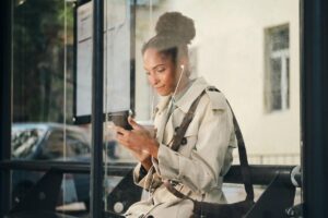 Travelers using a Japan transit app to save money on public transport
