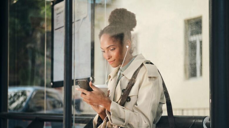 Travelers using a Japan transit app to save money on public transport