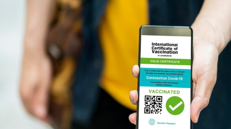 QR code luggage tag attached to travel bag at airport check-in counter