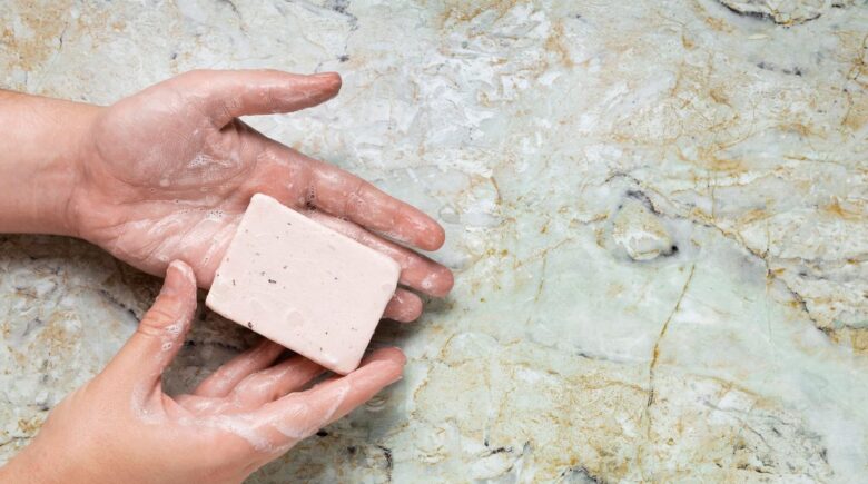 Travelers deciding between laundry pods and soap bars for a 2026 trip to Lisbon or Tallinn