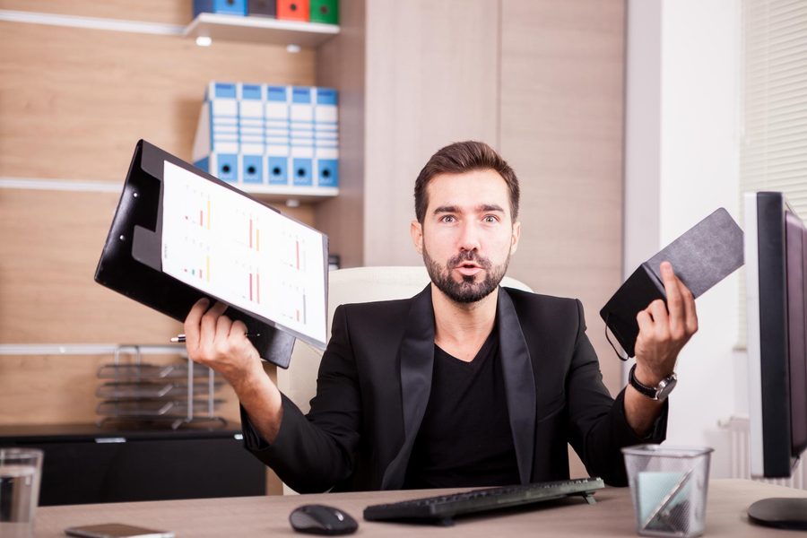 Small business owner comparing accounting software features on a laptop screen